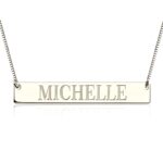 Engraved sterling silver name bar necklace close-up