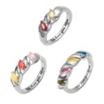Engraved silver ring with birthstones celebrating family love