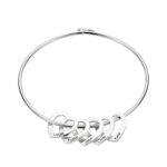 Engraved heart charm bangle for cherished moments