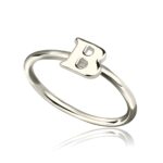 Hand-engraved sterling silver initial ring close-up