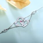 Carry Our Love Close – Engraved Interlocking Heart Bracelet with Birthstones – A Cherished Token for Her - Image 3