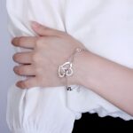 Carry Our Love Close – Engraved Interlocking Heart Bracelet with Birthstones – A Cherished Token for Her - Image 4