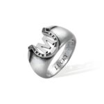Engraved horseshoe ring for him symbolizing luck