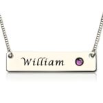 Personalized nameplate necklace with birthstone close-up