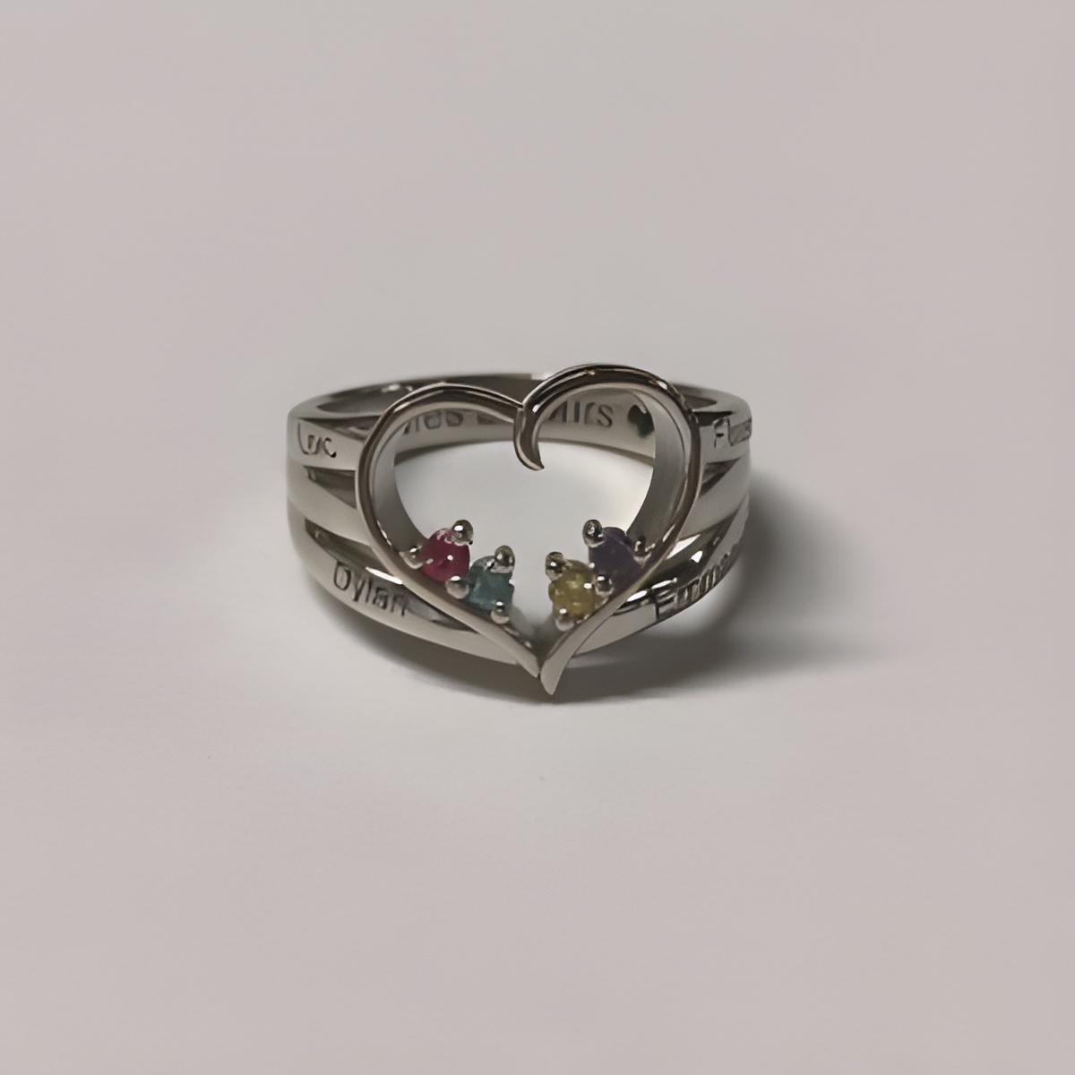 Engraved birthstone name ring to carry your love close