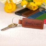 Carry Your Story – Custom Birth Flower Leather Keychain – A Cherished Token for Loved Ones and Special Moments - Image 2