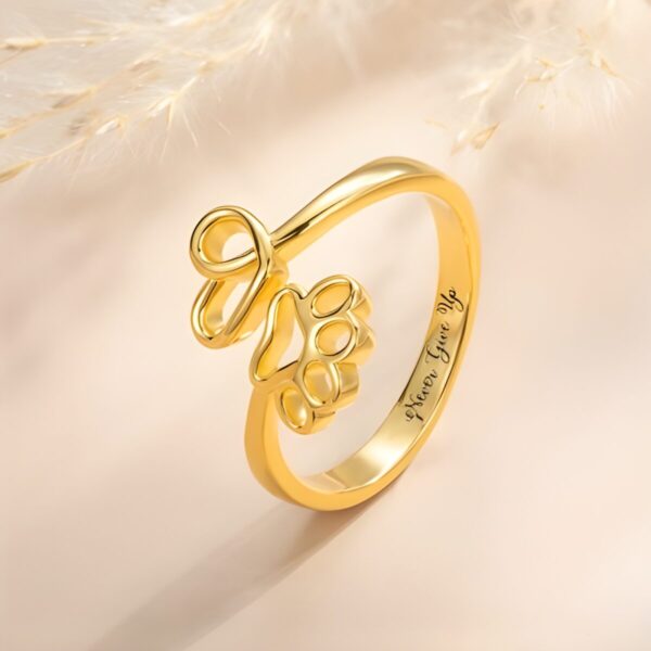 Engraved paw print memorial ring for pet lovers