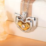 Embrace New Life – Birthstone Footprint Necklace Cradled by Loving Hands – A Tender Keepsake for New Moms - Image 3