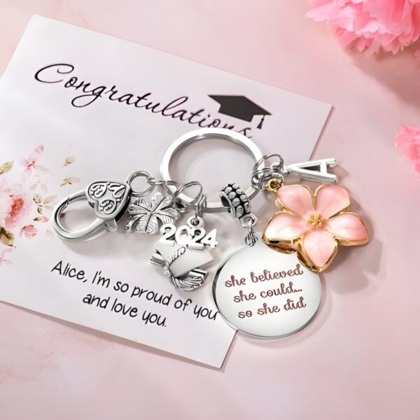 Personalized graduation keychain with clover and flower