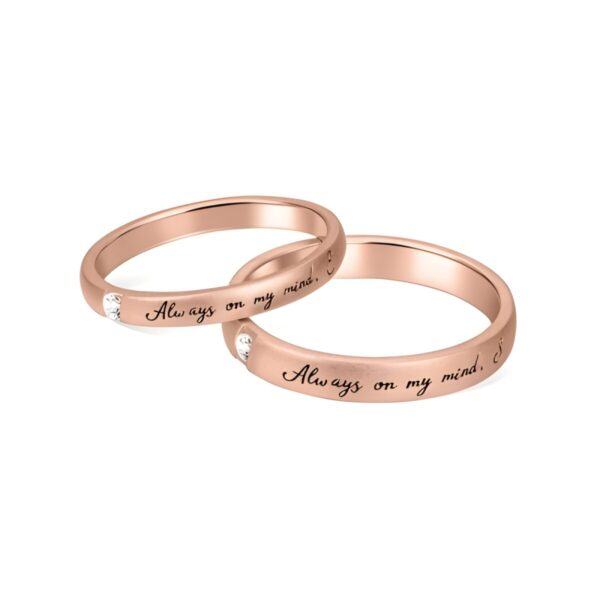 Engraved matching wedding rings symbolizing love