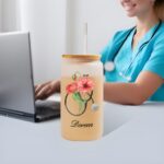 Personalized nurse tumbler with birth flower design