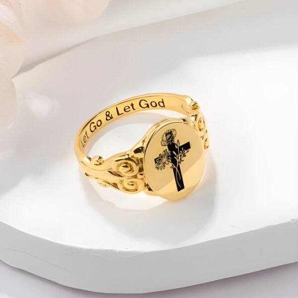 Custom birth flower cross ring symbolizing faith and bloom