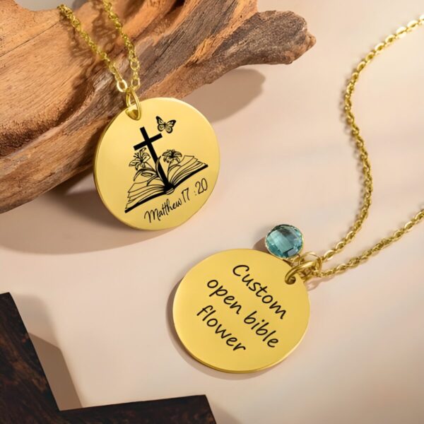 Engraved open Bible cross necklace symbolizing faith
